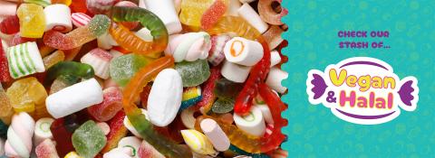 Vegan and Halal Sweets selection featuring gummy worms, marshmallows, fruit jellies, and colorful candies with a banner reading 'Check our stash of Vegan & Halal'