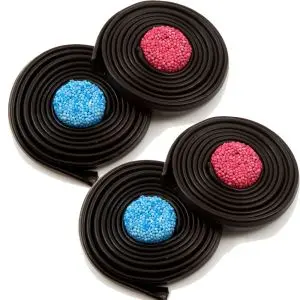 Traditional liquorice wheels sweets with a soft aniseed flavour, coloured round sweet in the centre.