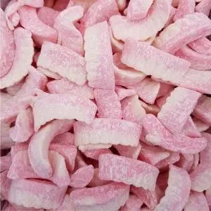 Sugar dusted pink and white gummy sweets shaped like teeth