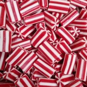 Mini candy canes are similar to strawberry pencils, but in stripes instead of tubes. Perfect Christmas sweets.