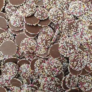 Hannahs brown jazzies are milk chocolate flavour buttons with multicoloured sprinkles on top