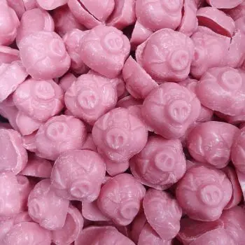 Strawberry flavour chocolate candy shaped like cute pigs heads