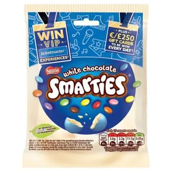 A bag of White Chocolate Smarties, colourful sweets made from white chocolate with a crispy sugar shell