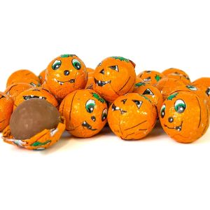 Milk chocolate balls wrapped in spooky pumpkin foil wrappers