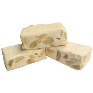 Chunks of chewy nougat filled with peanuts