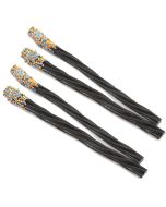 A bag of 4 barratts Liquorice Wands - Liquorice sticks dipped in candy pieces