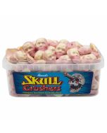 A full tub of strawberry and cream flavour Halloween sweets shaped like skulls