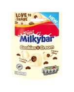 A share size pouch of Milkybar white chocolate sweets with a creamy filling and cookie pieces.
