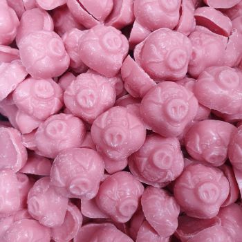 Strawberry flavour chocolate candy shaped like cute pigs heads