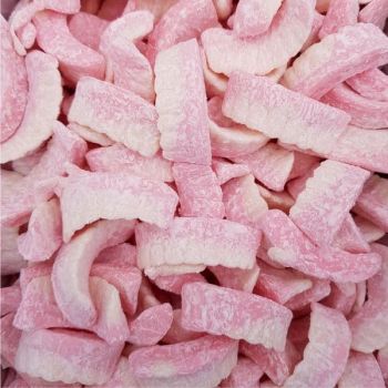 Sugar dusted pink and white gummy sweets shaped like teeth