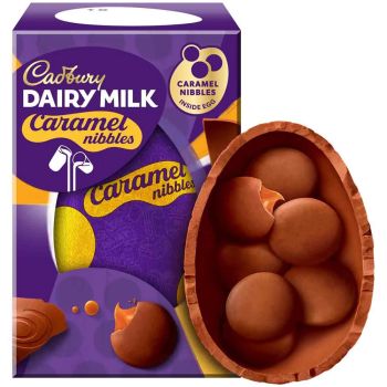 A hollow Cadbury Dairy Milk chocolate Easter egg filled with Cadbury Dairy Milk Caramel Nibbles. 