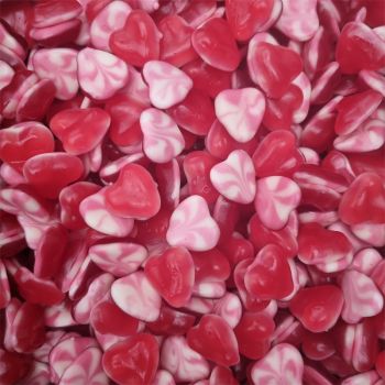 Retro Sweets - Pink and white jelly sweets in the shape of love hearts