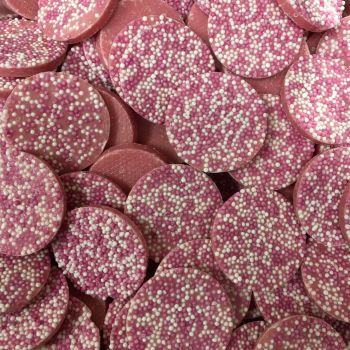 Hannahs mega snowies are white chocolate flavour discs with multicoloured sprinkles on top