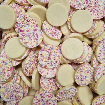 Hannahs mega snowies are white chocolate flavour discs with multicoloured sprinkles on top