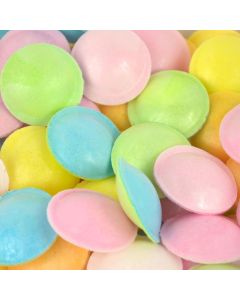 Multicoloured edible paper discs filled with sour sherbet powder