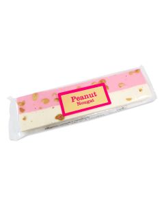 Soft pink and white nougat in a bar with Peanuts in