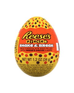 A milk chocolate hollow egg filled with reese's pieces candy
