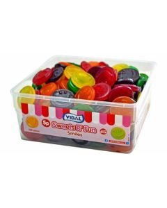 A bulk Vidal tub of sweets shaped like smiley faces