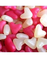 Pink and white jelly bean sweets in the shape of love hearts