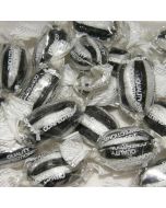 Black and white striped mint flavour boiled sweets, individually wrapped